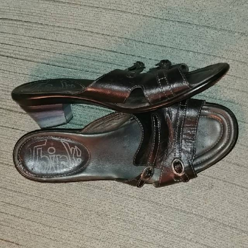 Think! black leather slides.